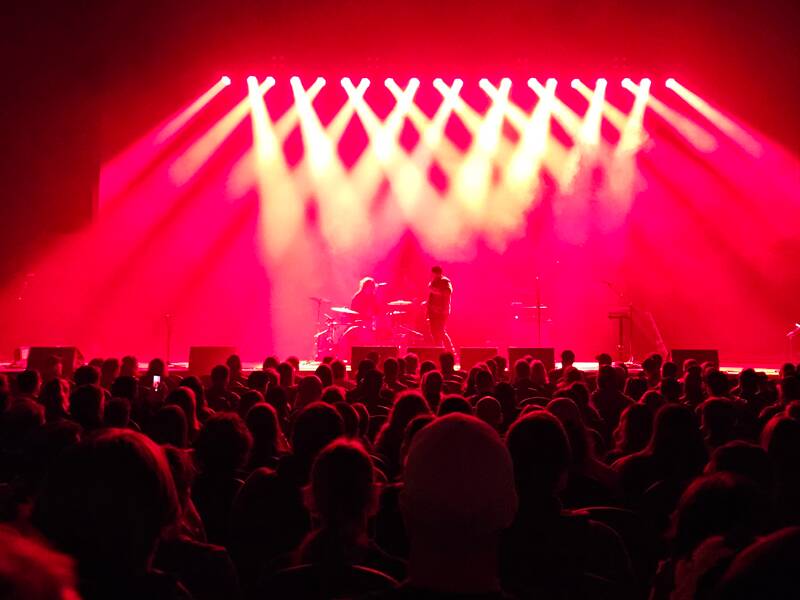 Red lights on stage at concert